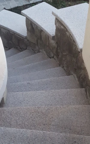 External stairs in bushhammered Sardinian granite P.I.L. Gran min