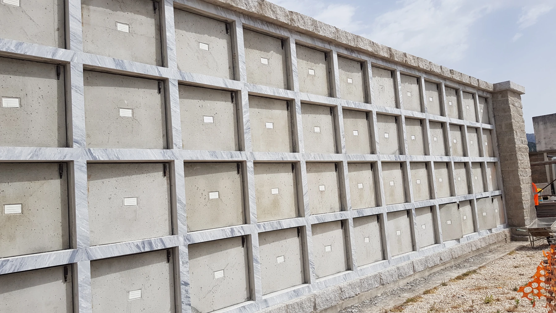 Granite burial niche covers P.I.L. Gran